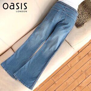 90s Oasis signature fit and flare leg blue jeans w/braided detail - size 30